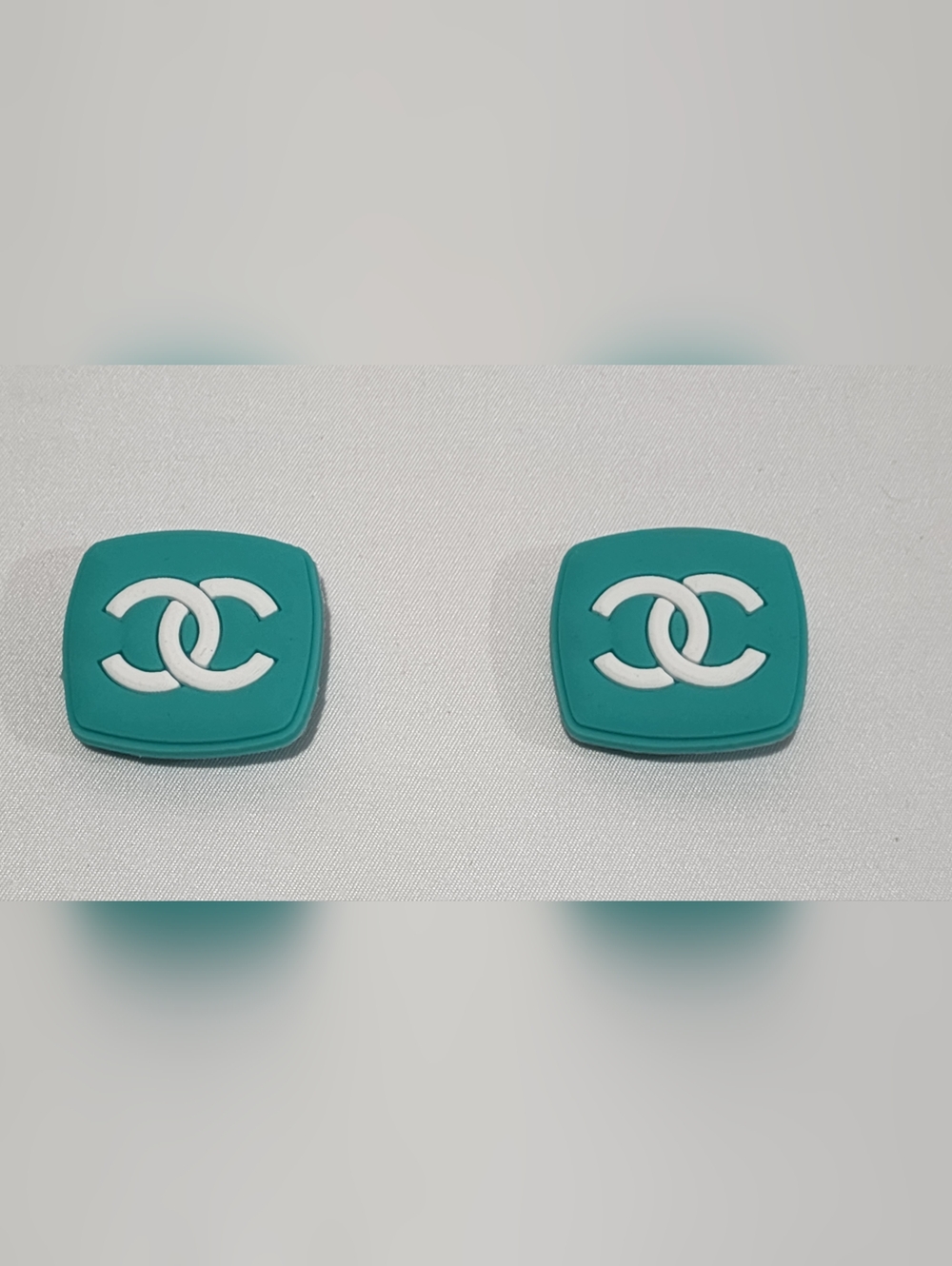 2 Shoe Charms CC teal and white Crocs Jibbitz